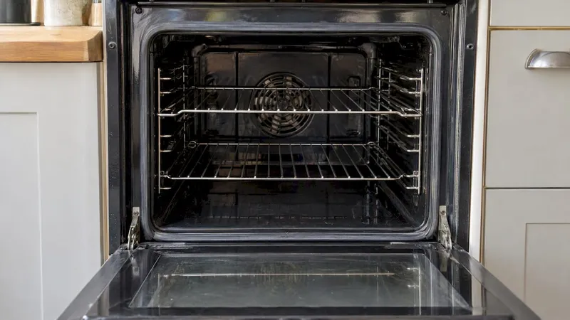 Clean oven interior and racks in rental kitchen